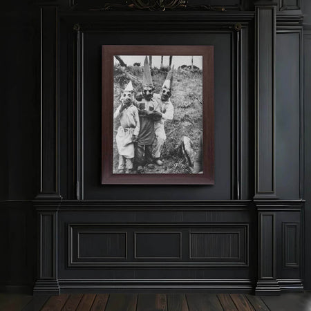 Wownic vintage creepy family photo poster displayed as framed gothic wall art in a dark interior