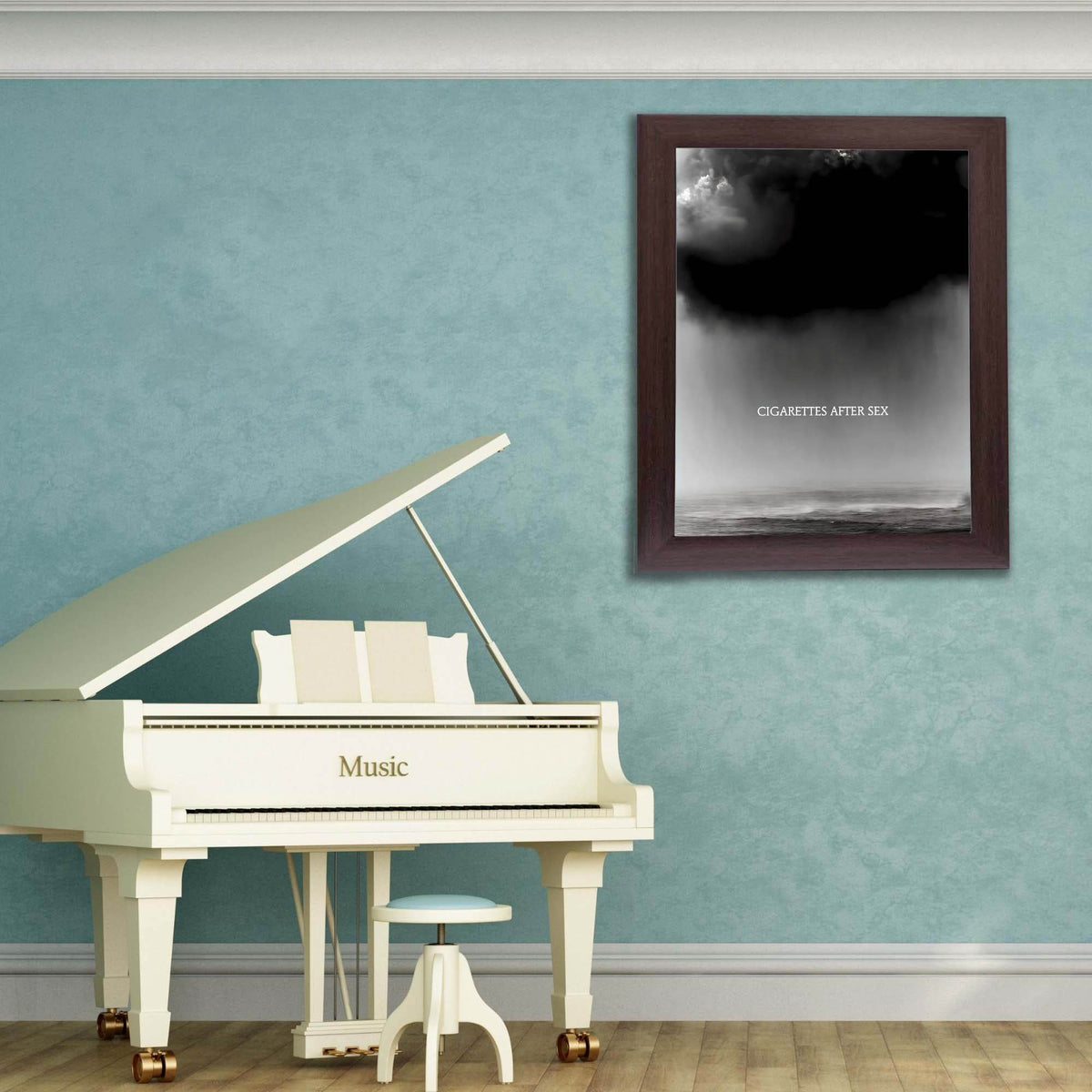 Wownic Cry music poster displayed as framed monochrome wall art in a music room above a piano