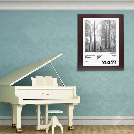Wownic Folklore music poster displayed in a framed music room setting above a piano