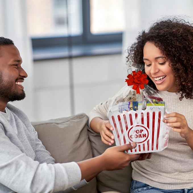 Wownic Keto Cravings movie night gift basket wrapped with snacks and reusable popcorn bin