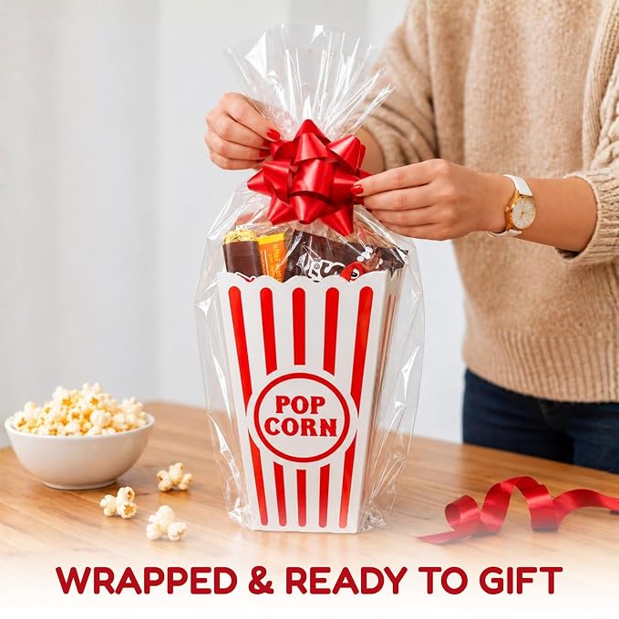 Wownic movie night popcorn and candy gift basket wrapped with clear gift wrap and red bow