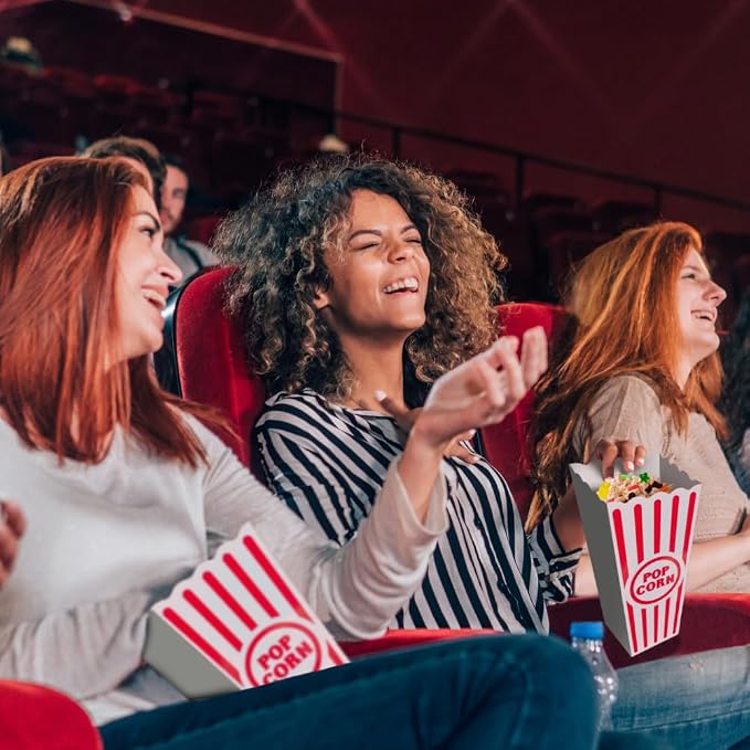 Wownic reusable popcorn bins being used during a movie theater night
