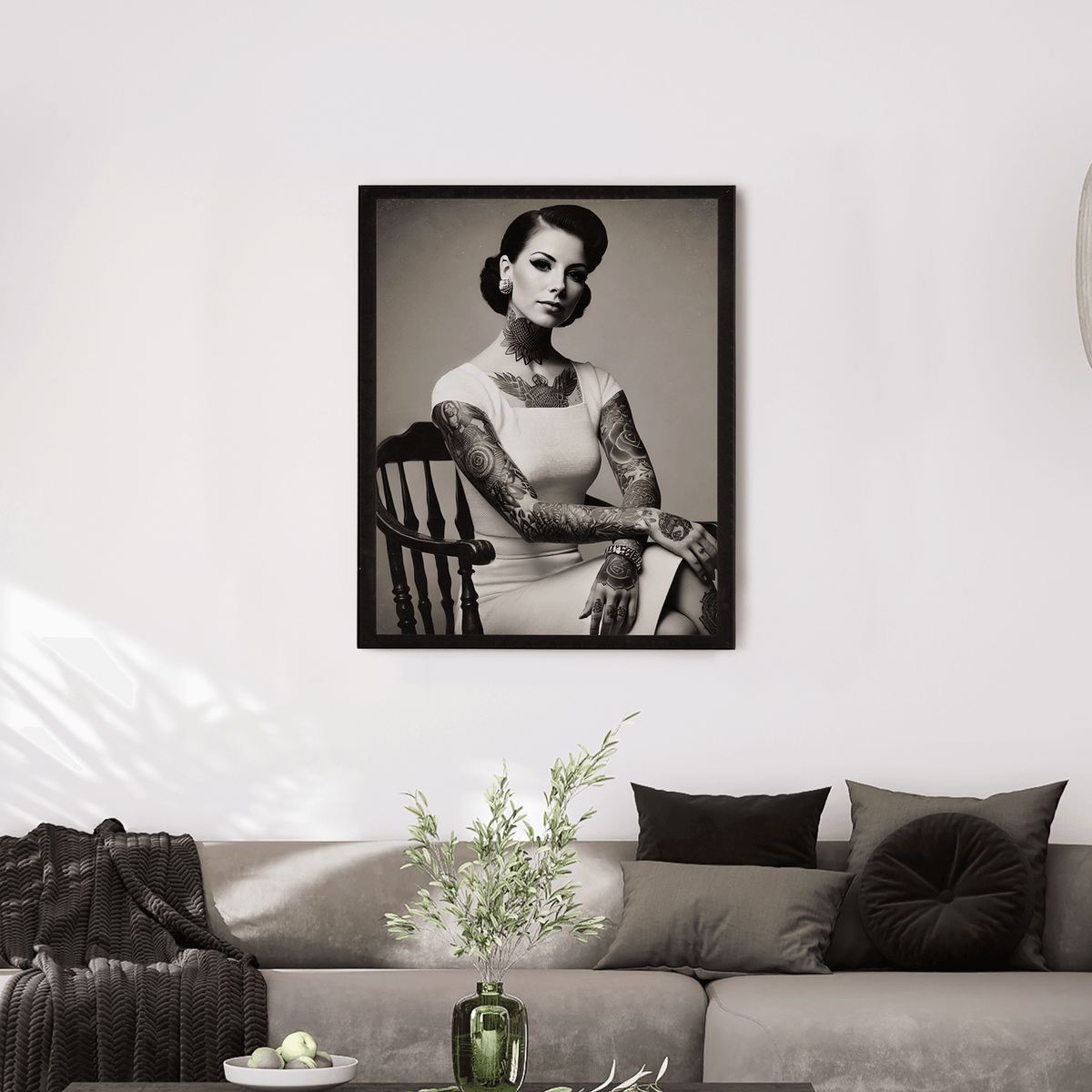 Wownic vintage tattooed woman poster displayed as framed black-and-white wall art above a modern sofa
