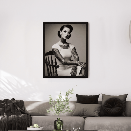 Wownic vintage tattooed woman poster displayed as framed black-and-white wall art above a modern sofa